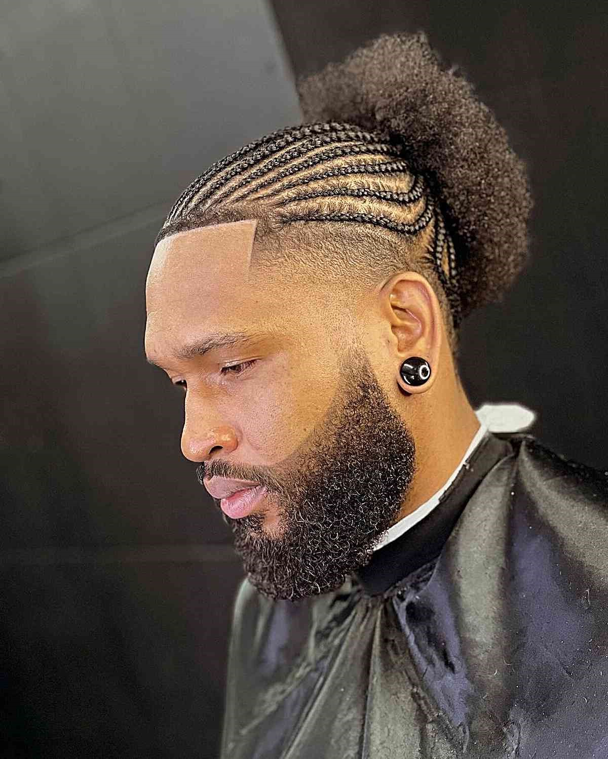 Trenzas africanas con un moño afro